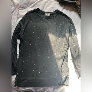 Super soft and cozy grey starry sweater.